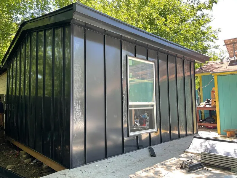 Black standing seam metal wall panels for Roof Inspection in Lorton