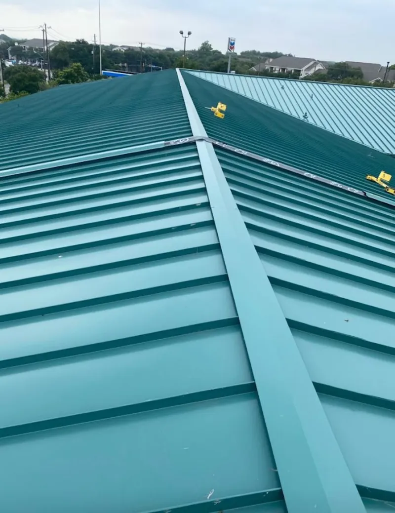 Green commercial metal roof ridge and valley for Metal Roof Repair in Lorton