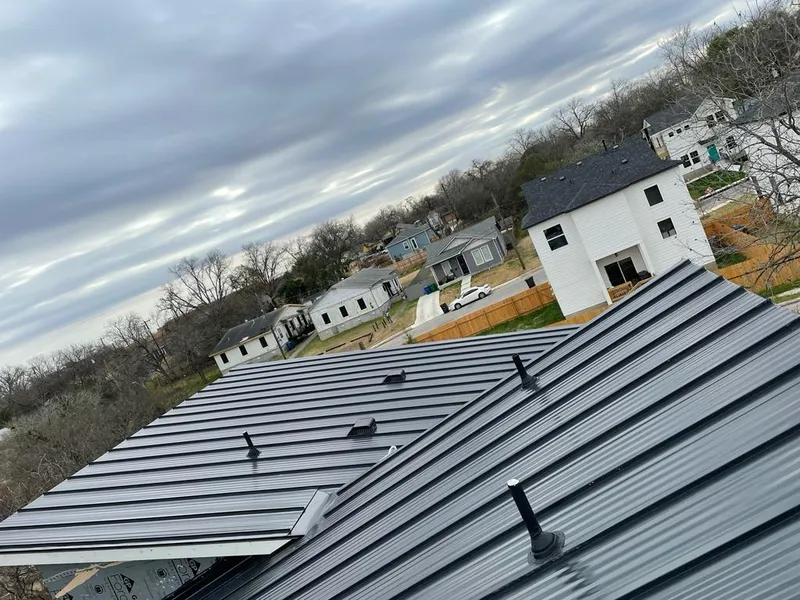 Standing seam metal roof panels with vents for Skylight Repair in Lorton